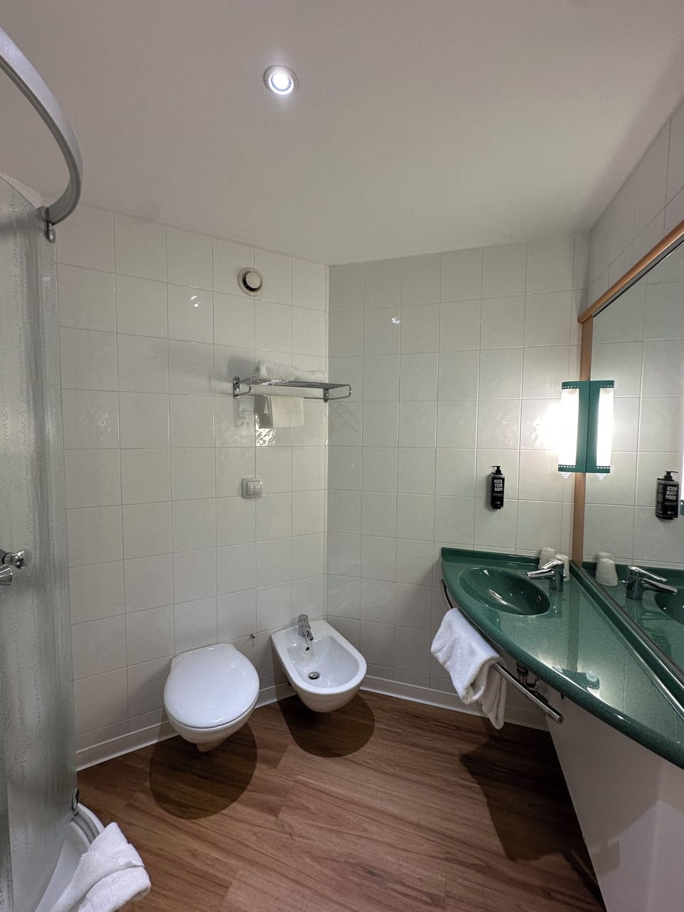 Combined shower/tub, eco-friendly toiletries, hair dryer, towels