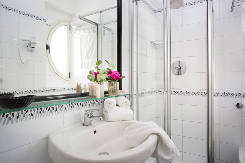 Hair dryer, bidet, towels, soap