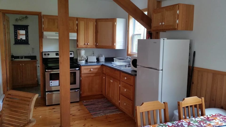 Green Chalet at Cabot Shores | Private kitchen | Shared fridge, microwave