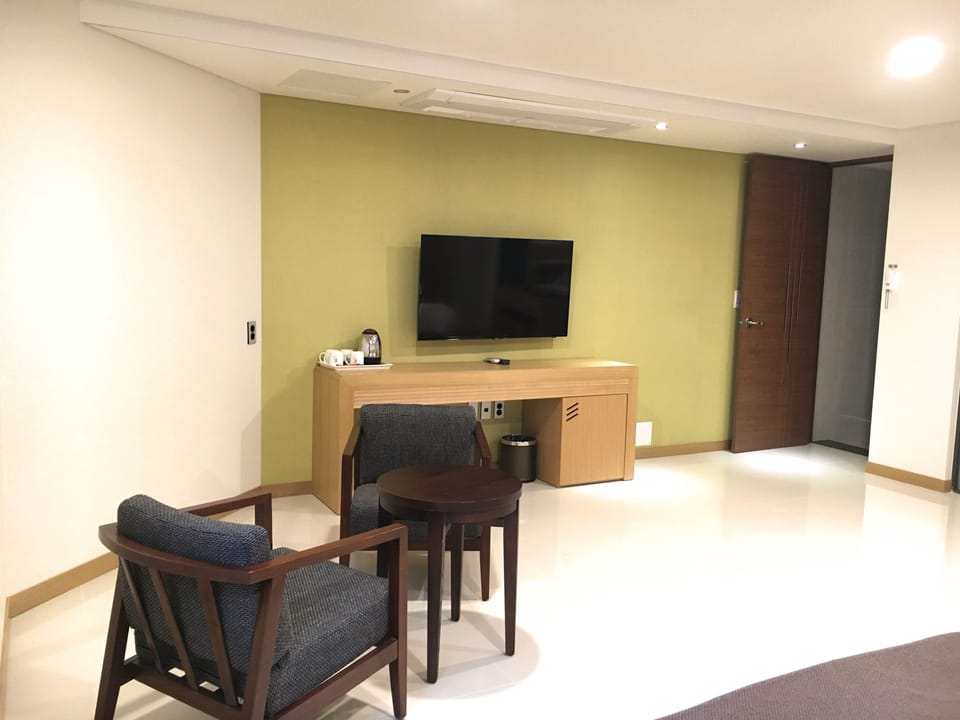 Family Room | Premium bedding, down comforters, free WiFi, bed sheets