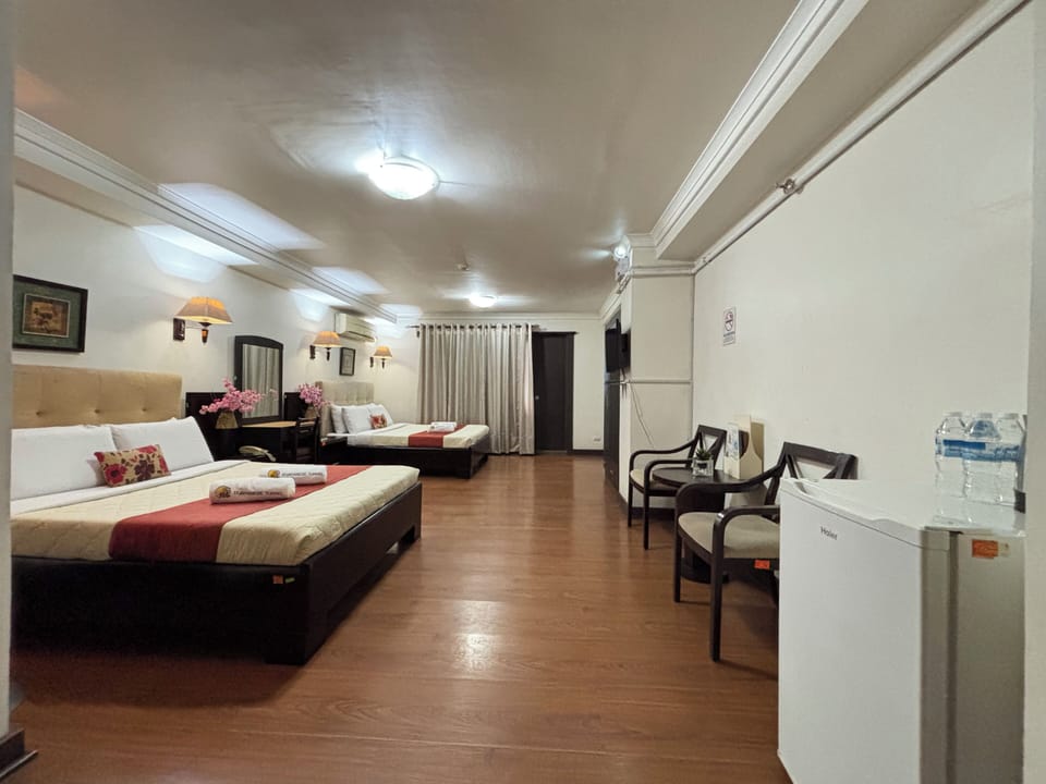 Premium Deluxe Room | Desk, blackout drapes, iron/ironing board, free WiFi