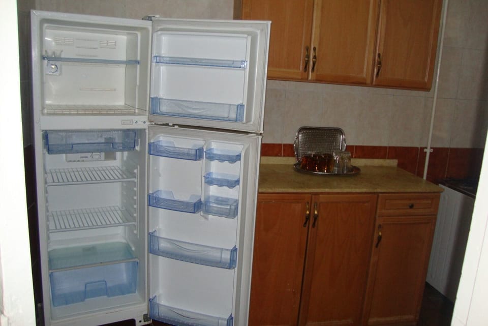 Apartment, 2 Bedrooms | Private kitchen | Fridge, stovetop, cookware/dishes/utensils