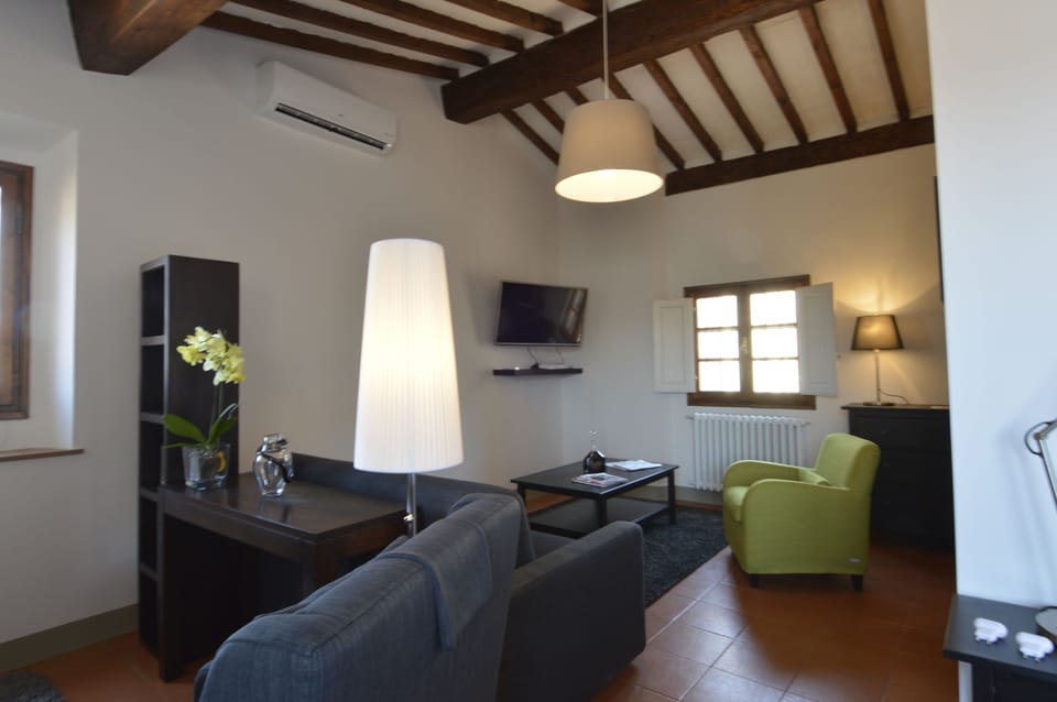 Suite, City View | Living room | LCD TV