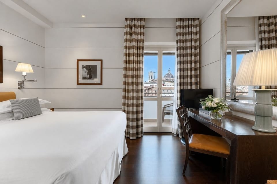 Duomo Double with Balcony | Down comforters, minibar, in-room safe, individually decorated