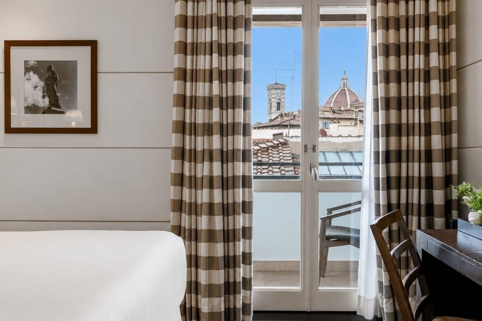 Duomo Double with Balcony | Down comforters, minibar, in-room safe, individually decorated