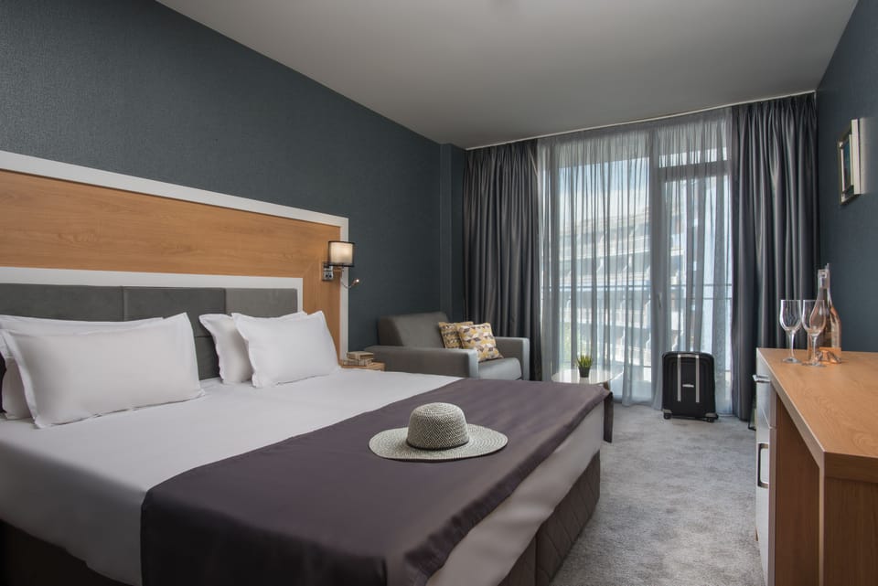 Double or Twin Room, Balcony | Desk, iron/ironing board, cribs/infant beds, rollaway beds