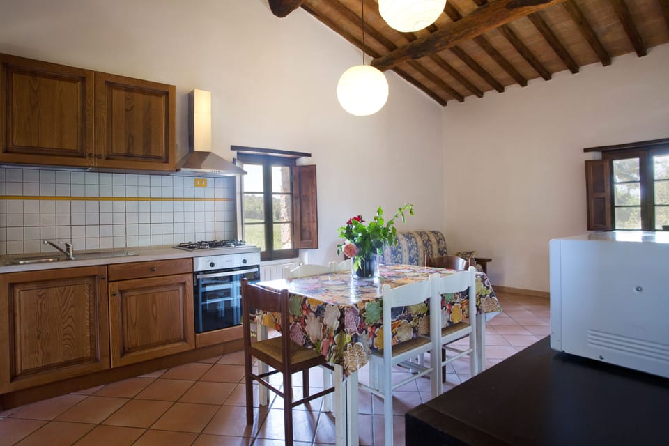 Apartment, 1 Bedroom, Ground Floor (Il Campo) | Private kitchen | Full-size fridge, coffee/tea maker