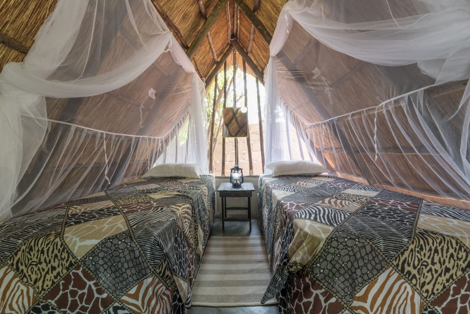 Twin Room, Shared Bathroom | In-room safe, bed sheets