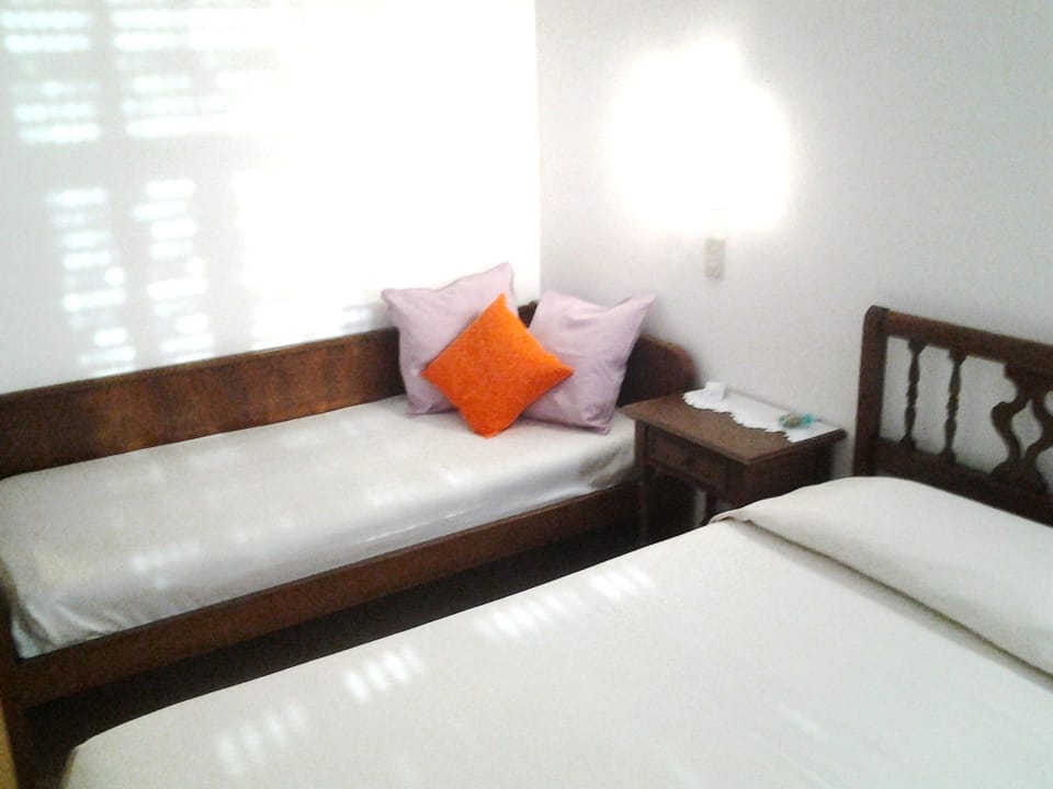 Standard Triple Room, City View | In-room safe, desk, cribs/infant beds, free WiFi