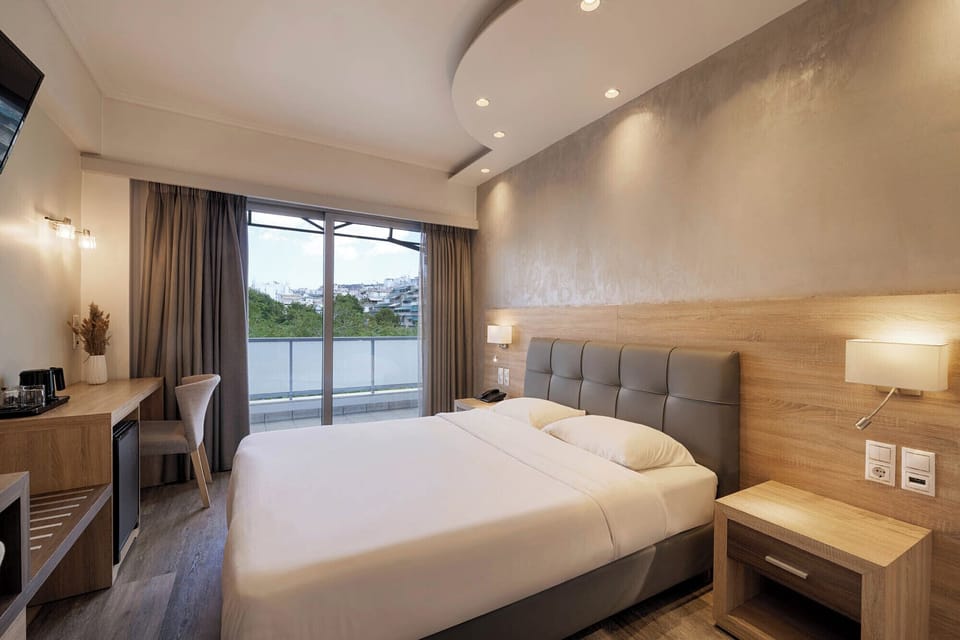 Superior Double or Twin Room | Minibar, in-room safe, desk, blackout drapes