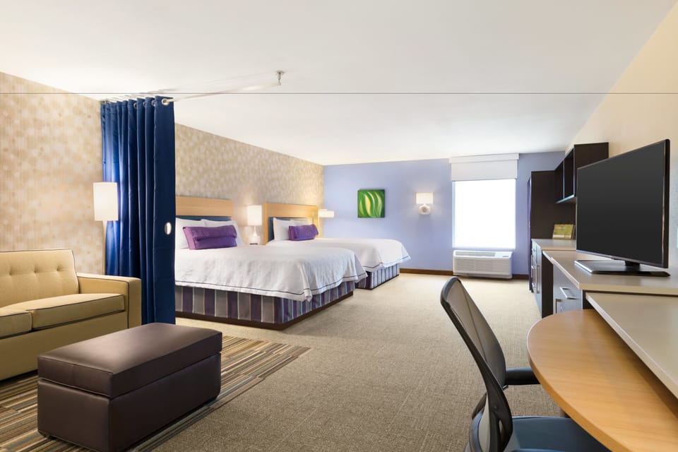 Hypo-allergenic bedding, in-room safe, desk, laptop workspace
