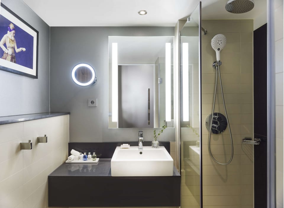 Shower, rainfall showerhead, eco-friendly toiletries, hair dryer
