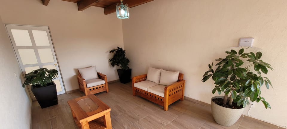 Deluxe Room | Living area | 43-inch Smart TV with cable channels, TV