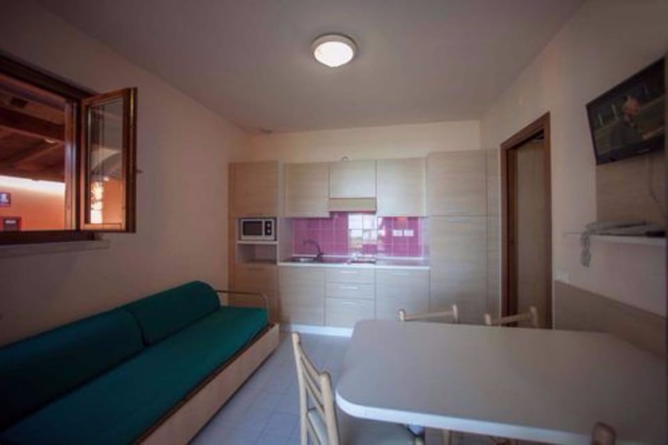 Apartment, 2 Bedrooms | Blackout drapes, cribs/infant beds