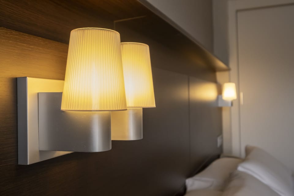 Double Room, 1 Queen Bed, Balcony, City View | Down comforters, in-room safe, desk, blackout drapes
