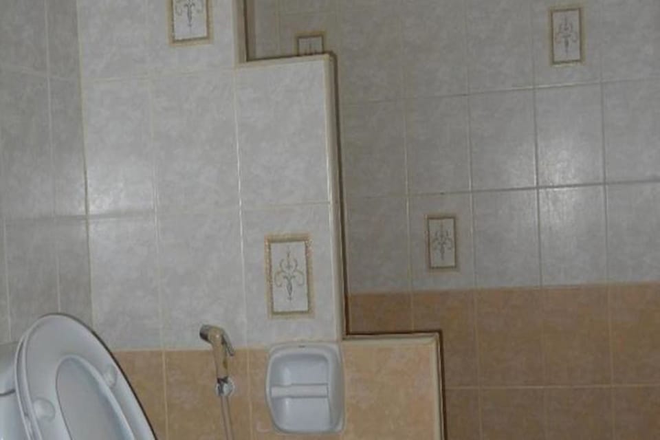 Bungalow, Air Conditioned | Bathroom | Shower, towels