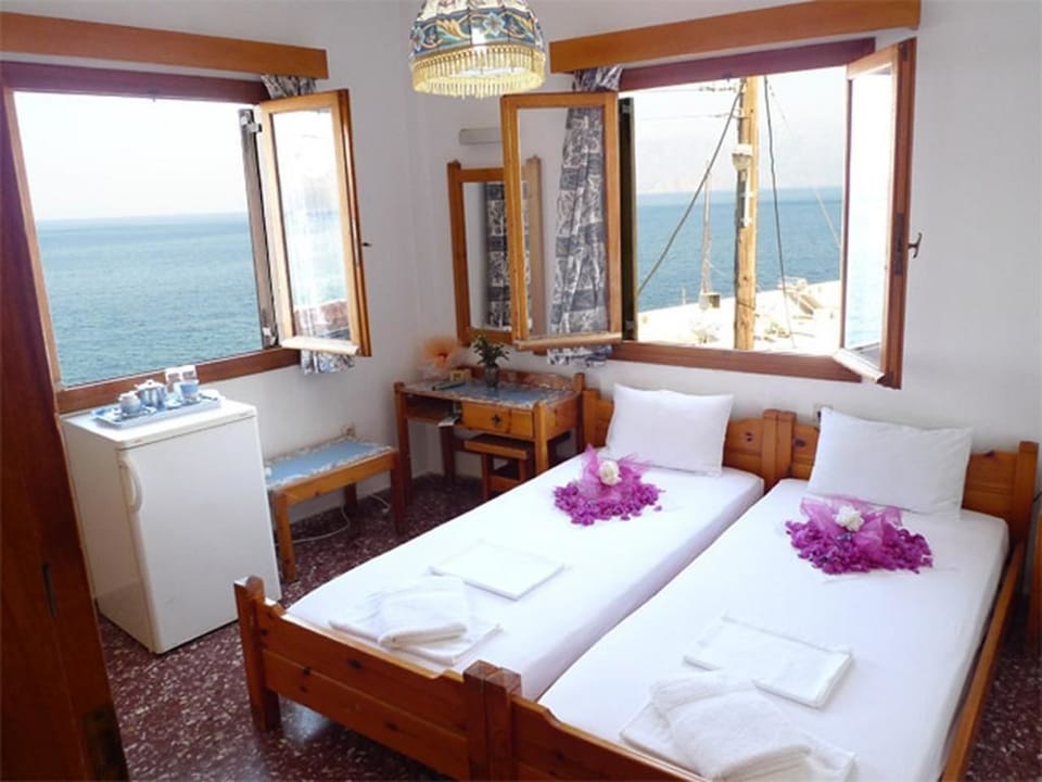 Twin Room, Balcony, Sea View | Desk, iron/ironing board, free cribs/infant beds, free WiFi