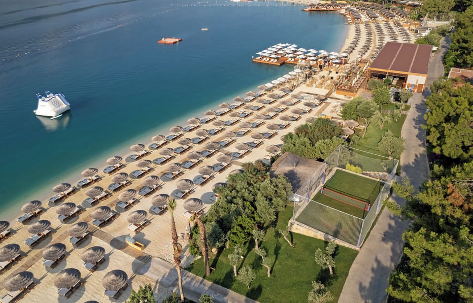 Private beach, free beach shuttle, beach cabanas, sun loungers