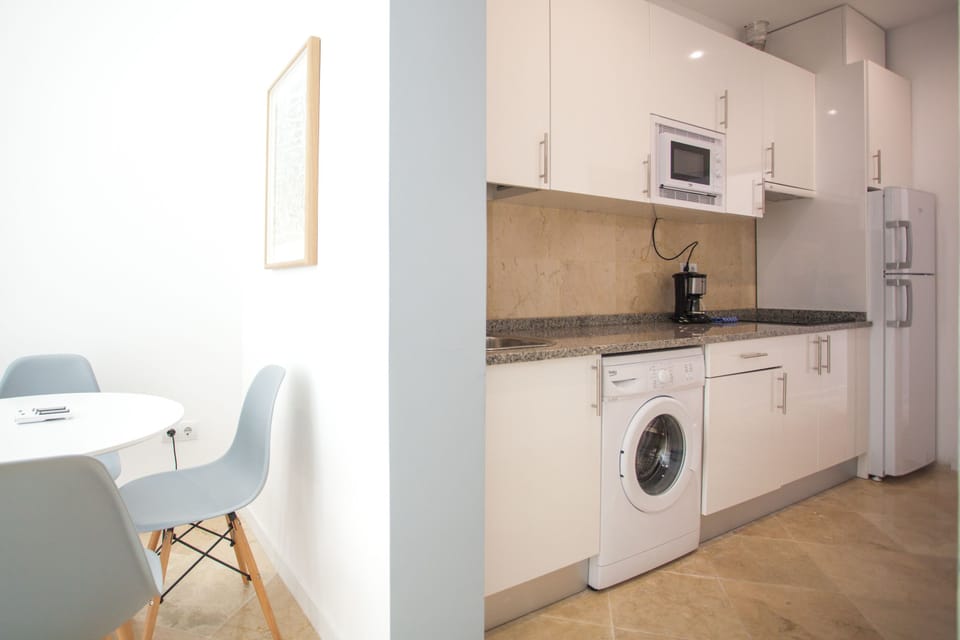 Apartment, 2 Bedrooms | Private kitchen | Fridge, microwave, stovetop, coffee/tea maker