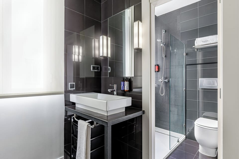 Eco-friendly toiletries, hair dryer, towels