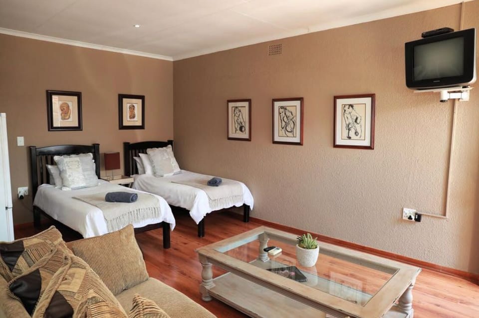 Quadruple Room (4 Self catering) | Minibar, desk, soundproofing, iron/ironing board