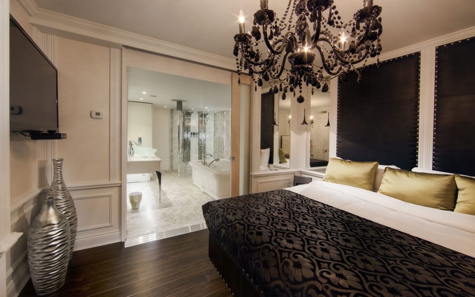 Pink Premium Suite, 1 King Bed and 1 Queen Murphy Bed | In-room safe, desk, blackout drapes, iron/ironing board