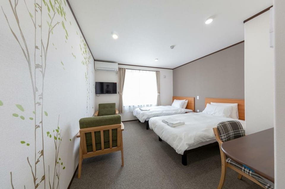 Basic Twin Room, Non Smoking, Refrigerator (2 Single Beds Or 1 King Bed) | In-room safe, desk, free WiFi, bed sheets
