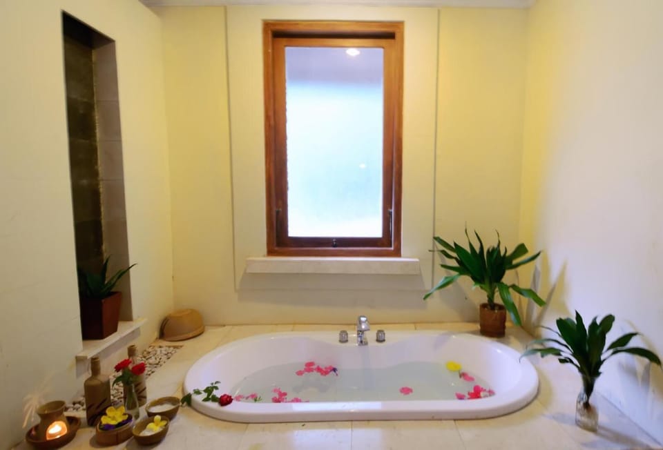 Shower, free toiletries, slippers, towels