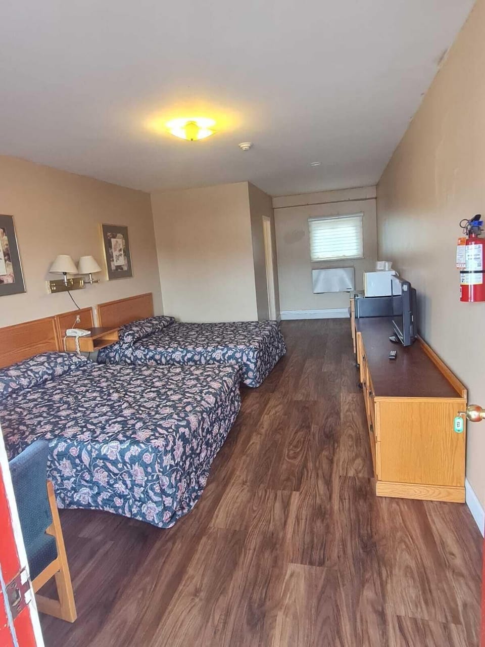 Room, 2 Queen Beds, Non Smoking | Minibar, iron/ironing board, WiFi (free), bed sheets