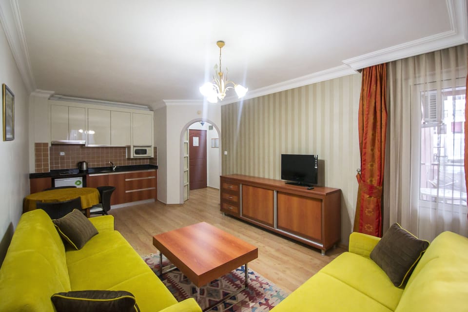 Apartment, 1 Bedroom | Living area | LCD TV