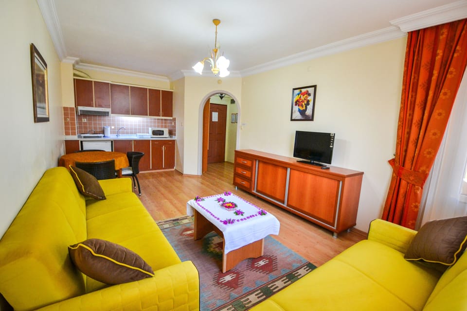 Apartment, 1 Bedroom | Living room | LCD TV