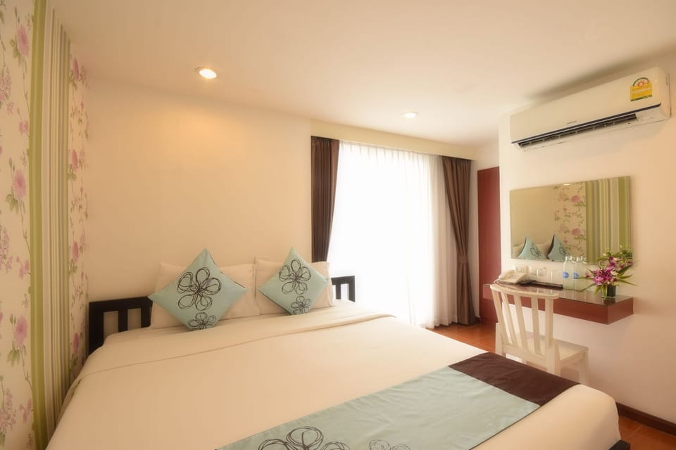 Standard Room | Individually decorated, individually furnished, desk, blackout drapes