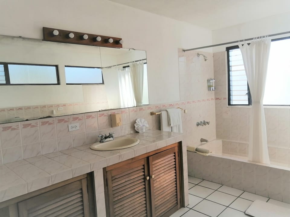 Standard Quintuple Room, 5 single beds  | Bathroom | Designer toiletries, hair dryer, towels