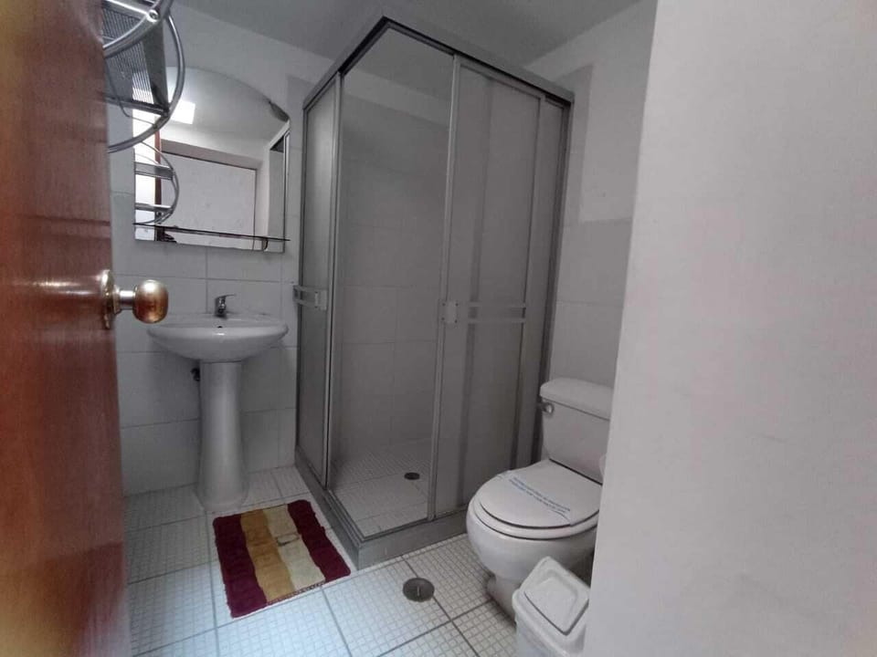 Shower, rainfall showerhead, designer toiletries, towels