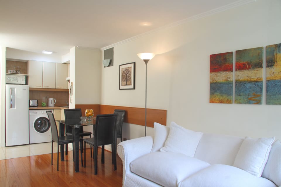Business Apartment, 1 Bedroom | Living room | 25-inch flat-screen TV with cable channels, TV, DVD player