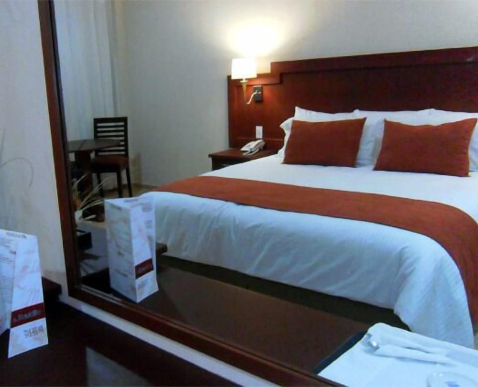 Premium bedding, blackout drapes, free WiFi, bed sheets