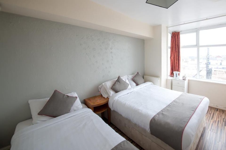Standard Triple Room, Private Bathroom | Free WiFi, bed sheets