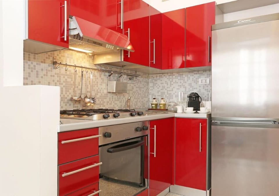 Deluxe Condo, 1 Bedroom, City View, Executive Level | Private kitchen | Fridge, coffee/tea maker, electric kettle, cleaning supplies