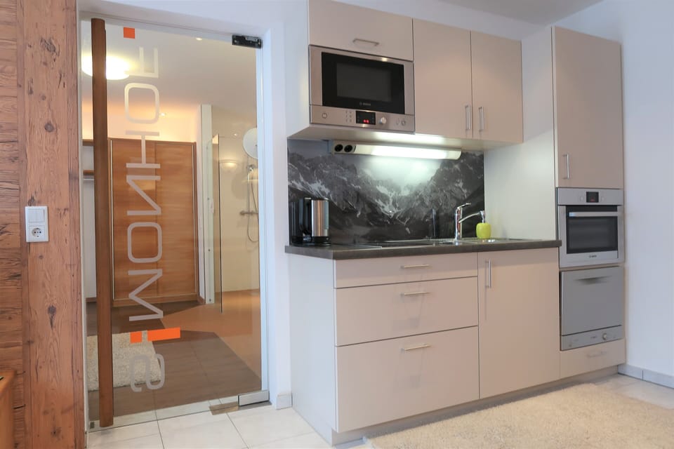 Family Apartment, 2 Bedrooms, Sauna, Mountain View | Private kitchen | Coffee/tea maker, microwave, electric kettle, highchair