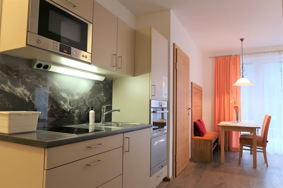Family Apartment, 2 Bedrooms, Sauna, Ground Floor | Private kitchen | Coffee/tea maker, microwave, electric kettle, highchair