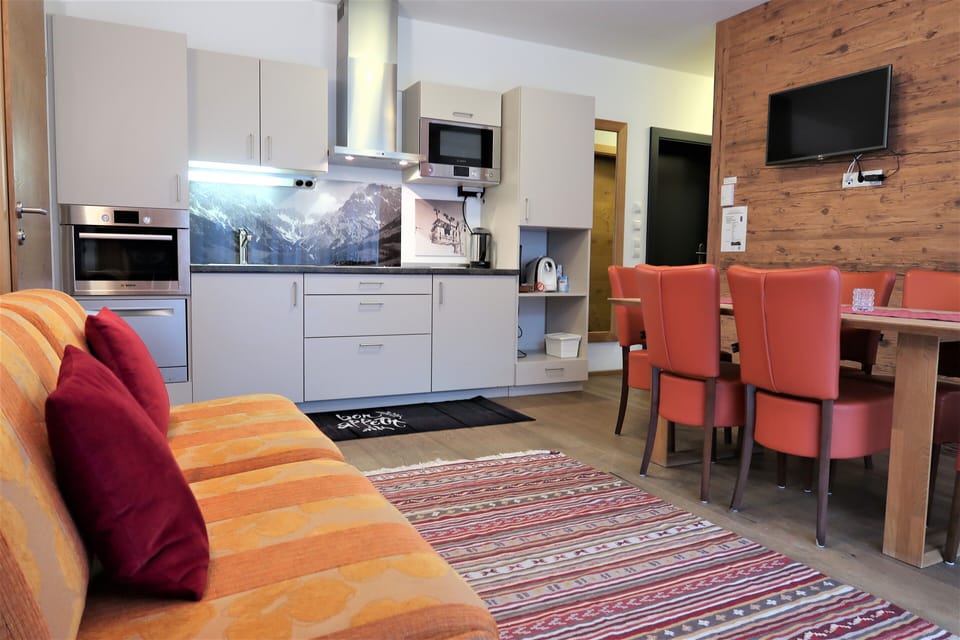 Comfort Apartment, 3 Bedrooms, Sauna, Ground Floor | Living area | Flat-screen TV, heated floors