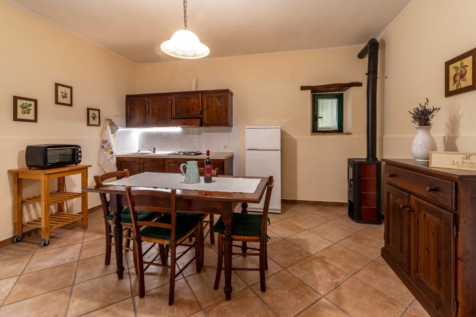 Apartment, 1 Bedroom (Olivo C) | Living area | Flat-screen TV