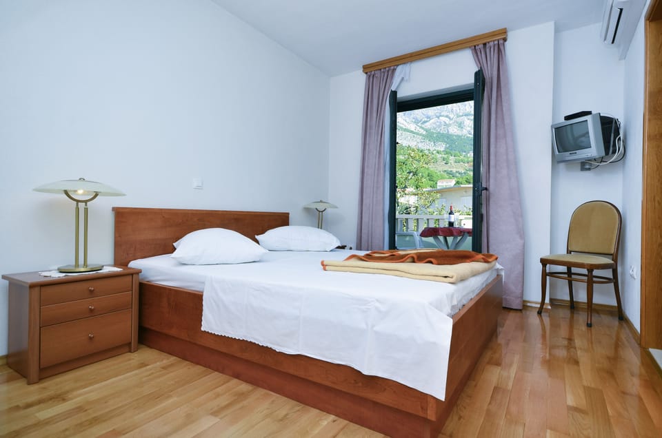 Double Room, Balcony, Mountain View | In-room safe, desk, blackout drapes, iron/ironing board