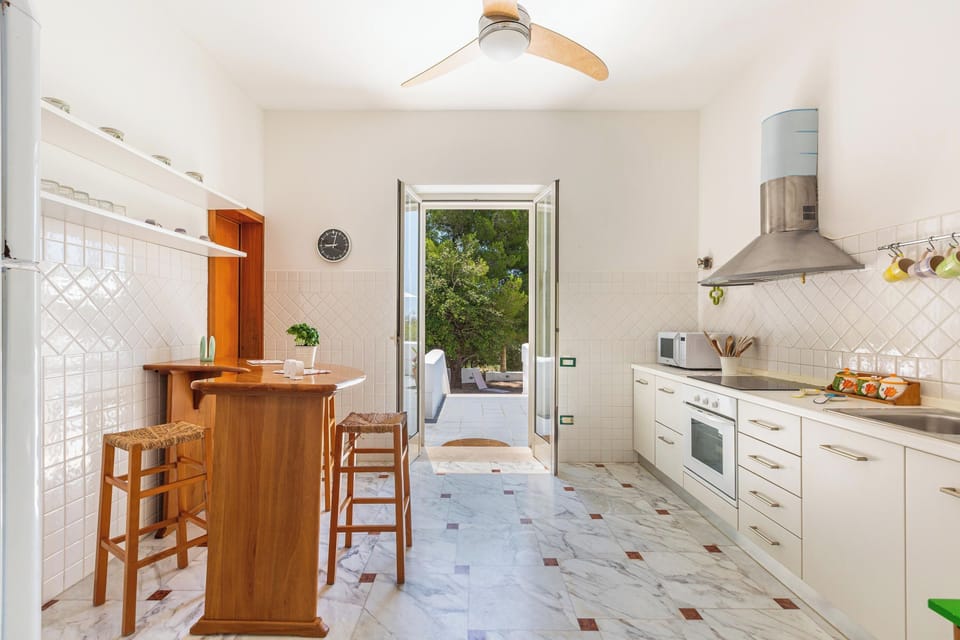 Villa, 5 Bedrooms | Private kitchen | Fridge, microwave, oven, stovetop