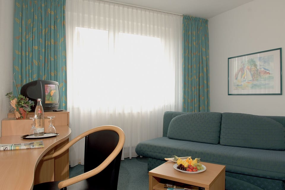 Standard Studio, 1 Double Bed | Living area | TV