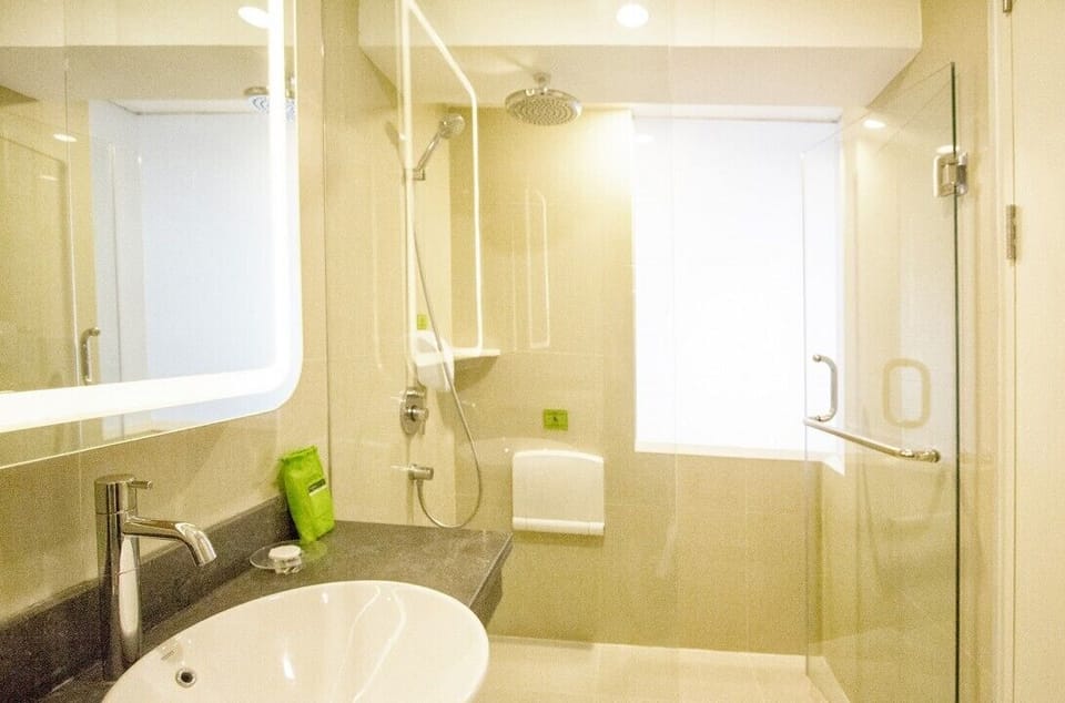 Shower, free toiletries, slippers, towels