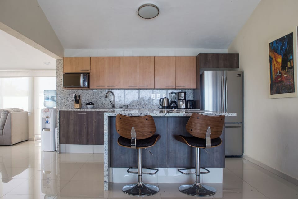 Standard Suite, 2 Bedrooms | Private kitchen | Fridge, microwave, stovetop, coffee/tea maker