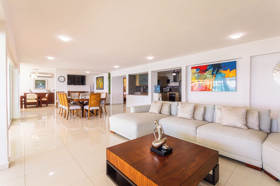 Condo, 4 Bedrooms | Living area | 55-inch flat-screen TV with cable channels, TV