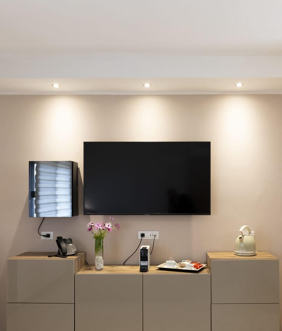 Family Apartment | Minibar, in-room safe, desk, free WiFi