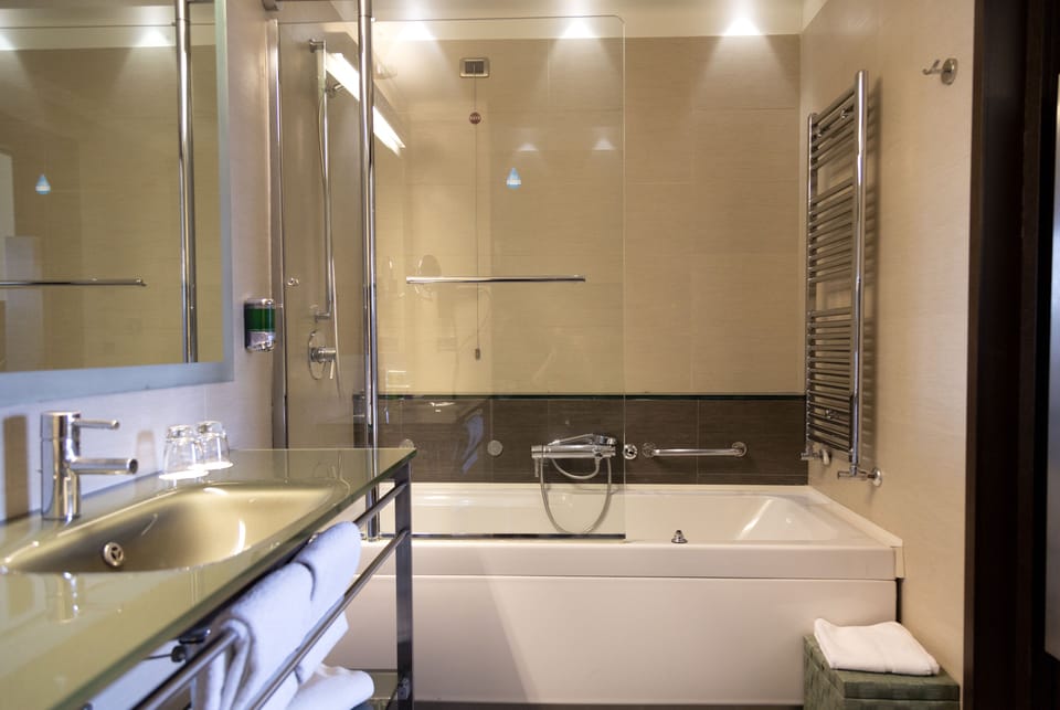 Bathroom | Hair dryer, slippers, bidet, towels